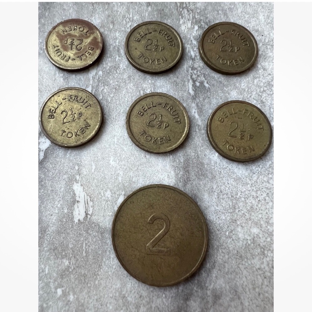 7 vintage collectible tokens….